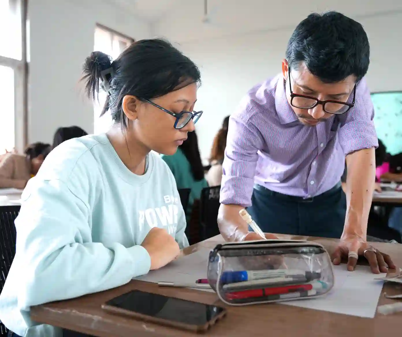 Students walking on the modern campus of MIT University India, a top destination for higher education and student life