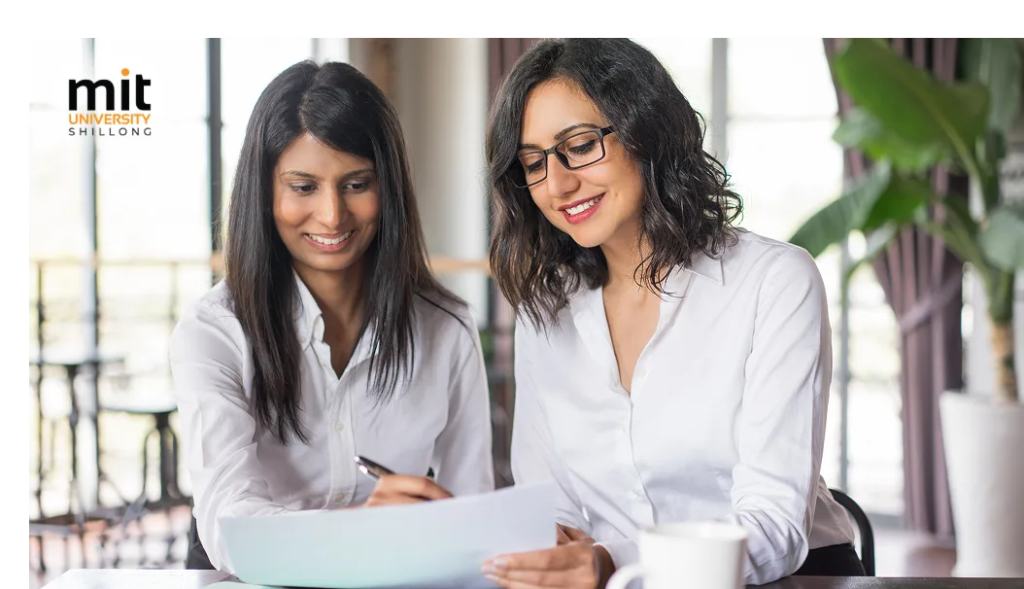B.Com student at an internship desk with corporate mentor