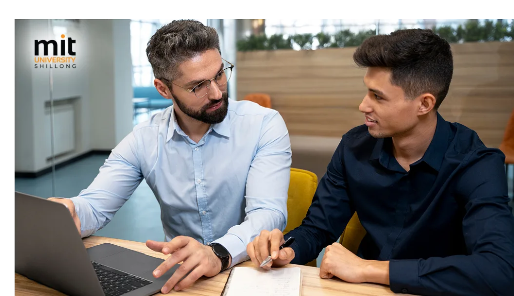 Faculty and student in one-on-one mentoring session